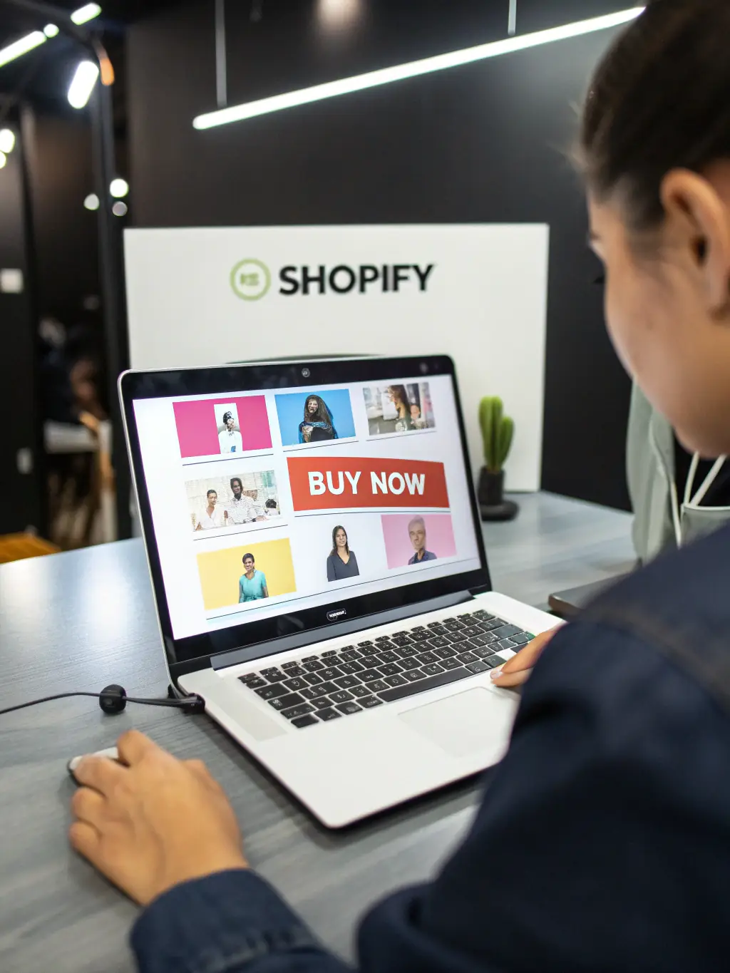 A clean, modern Shopify theme showcasing a high-end DTC brand on a desktop computer, emphasizing visual appeal and user experience.